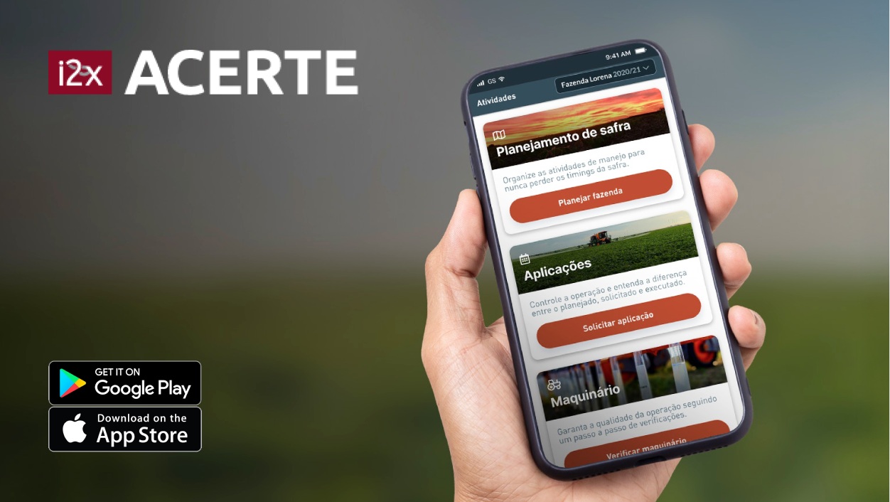 uma mão segurando um smartphone com o aplicativo i2x acerte aberto